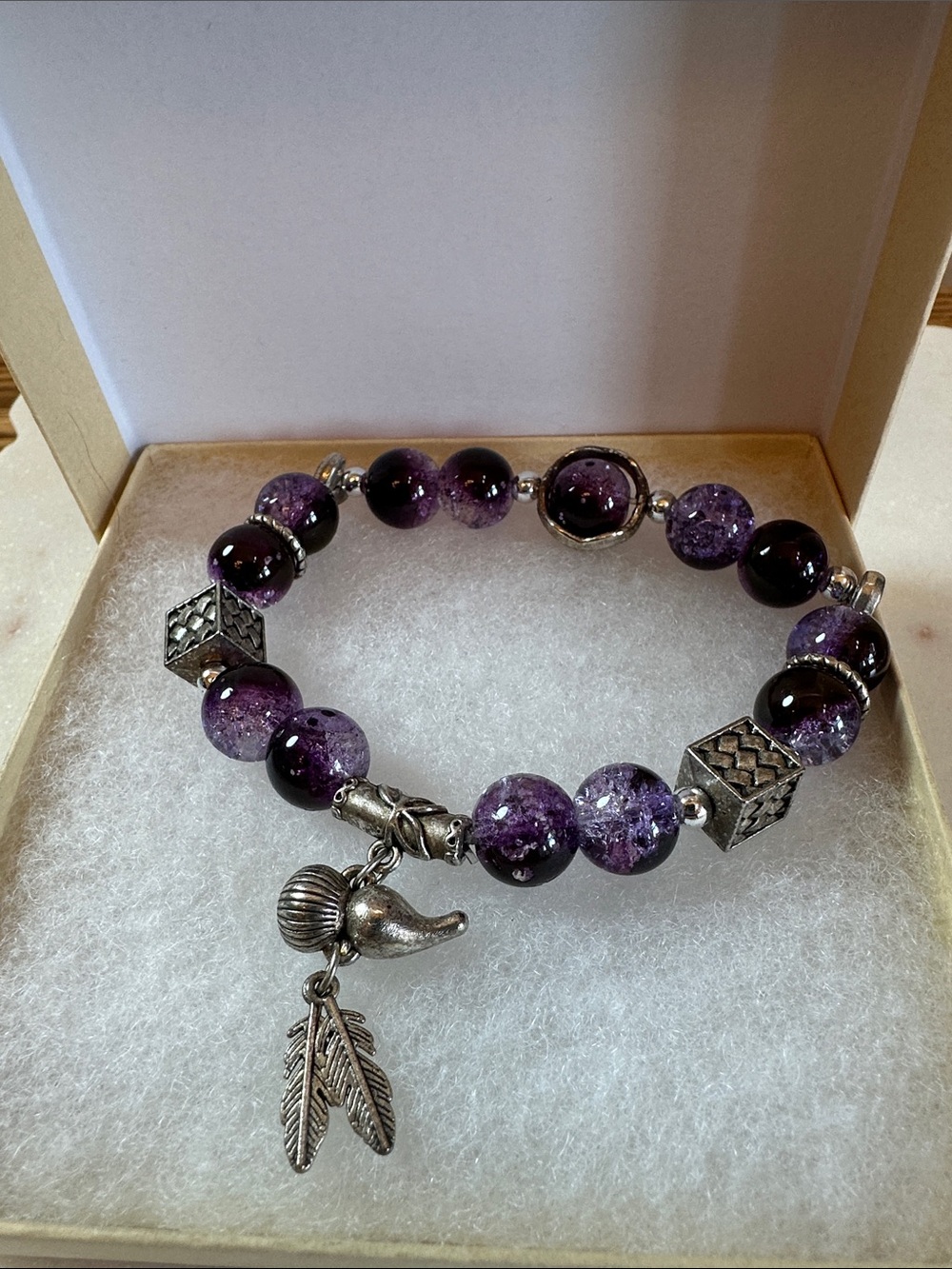 Purple Beaded Charm Bracelet with Silver Feather Accents
